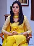 Spicy Hot Videos and Galleries: Tamanna cute in tight yellow