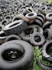 Rubber Plantation. A field full of discarded tyres at the old Capper Pass - via Daymix