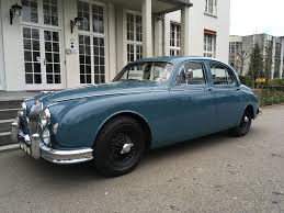 Image result for Silver Blue 1959 Jaguar