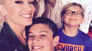 Image result for Queen B by Bumbleride $428 Gwen Stefani and Gavin Rossdale with Kingston and Zuma at the LA zoo