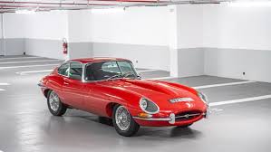 Image result for Maroon 1962 Jaguar