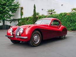 Image result for Burgundy 1983 Jaguar