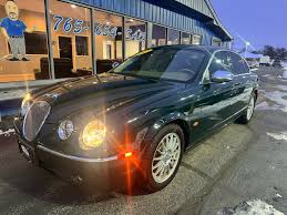Image result for Winter Gold Pearl 2007 Jaguar