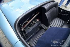 Image result for Silver Blue 1959 Jaguar