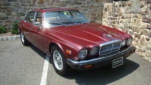 Image result for Sebring Red 1986 Jaguar