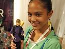 Paula Rodriguez introduces the new Justin Bieber doll. > (Noonan for News) - image
