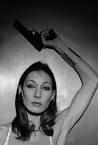http://i11.photobucket.com/albums/a170/aierdna/anjelica%2520huston/AnjelicaHuston-Whydontyou1976.jpg