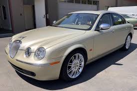Image result for Winter Gold Pearl 2007 Jaguar