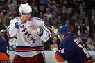 Derek Boogaard death: Family of NHL brawler sues NHL over his