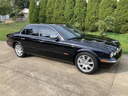 Image result for Black 2004 Jaguar