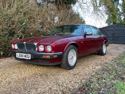 Image result for Black Cherry 1991 Jaguar