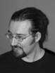 Zak Greant is a happy member of the Open Source community where he spends