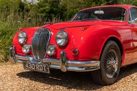 Image result for Carmen Red 1961 Jaguar