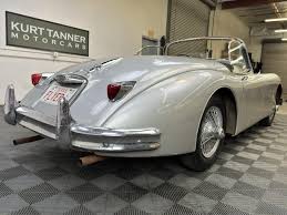 Image result for Silver Blue 1959 Jaguar