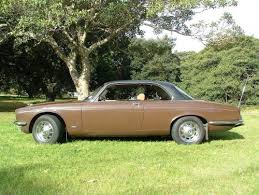 Image result for Carriage Brown 1977 Jaguar
