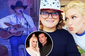 Image result for Queen B by Bumbleride $428 Gwen Stefani and Gavin Rossdale with Kingston and Zuma at the LA zoo