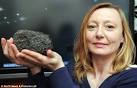 is holding the meteor that