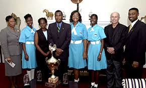 From left are Aquinas College Principal Ms. Elizabeth Miller, 11th-grader and Prefect Alana Kemp, Aquinas College graduate TeShalla Clarke, ... - aquinas_students