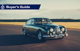 Image result for Silver Blue 1959 Jaguar