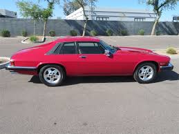 Image result for Sebring Red 1986 Jaguar