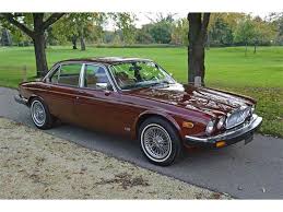 Image result for Burgundy 1983 Jaguar