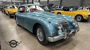 Image result for Silver Blue 1959 Jaguar