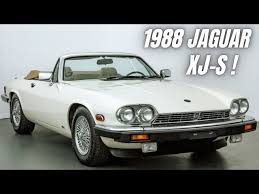 Image result for Glacier White 1988 Jaguar