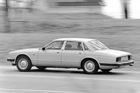 Image result for Nimbus White 1987 Jaguar