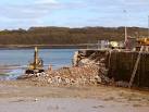 of me clambering about the building site with my small compact camera. - via Daymix