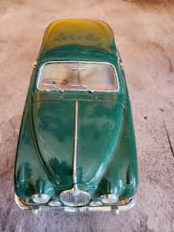 Image result for Dark Green 1959 Jaguar