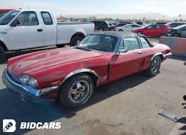 Image result for Grenadier Red 1987 Jaguar