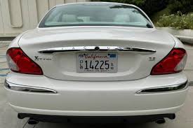 Image result for White Onyx 2002 Jaguar