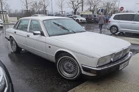 Image result for Glacier White 1989 Jaguar