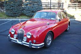 Image result for Carmen Red 1961 Jaguar