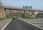 The tightly curved bridge crosses the point of divergence between the access - via Daymix