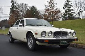 Image result for Nimbus White 1987 Jaguar