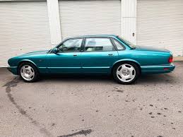 Image result for Bright Turquoise 1995 Jaguar