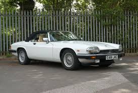 Image result for Nimbus White 1987 Jaguar