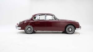 Image result for Maroon 1962 Jaguar