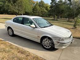 Image result for White Onyx 2002 Jaguar