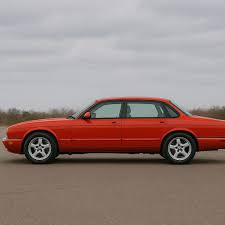 Image result for Carnival Red 1999 Jaguar