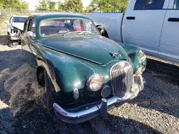 Image result for Dark Green 1959 Jaguar