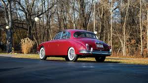 Image result for Maroon 1962 Jaguar