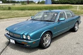 Image result for Turquoise 1973 Jaguar