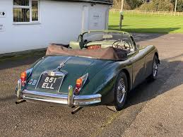 Image result for Dark Green 1959 Jaguar
