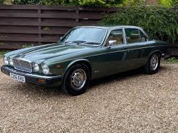 Image result for Poseidon Dark Green 1985 Jaguar