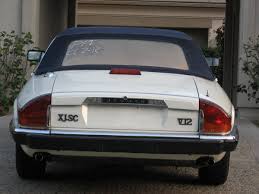 Image result for Nimbus White 1987 Jaguar