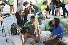Television crew shooting a - via Daymix