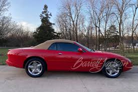 Image result for Phoenix Red 1999 Jaguar