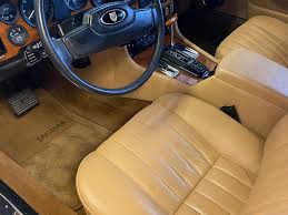 Image result for Nimbus White 1987 Jaguar